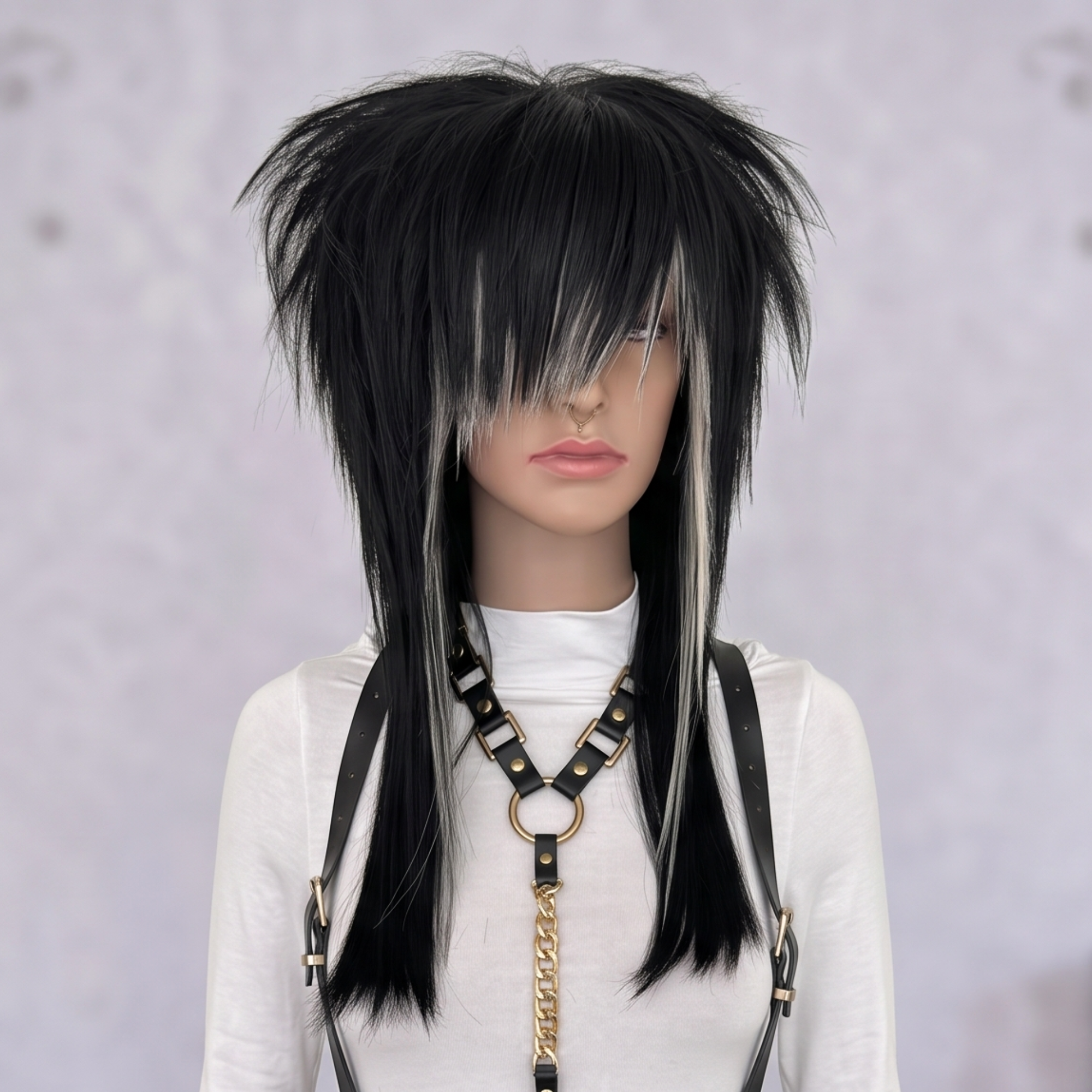 Front angled view of black and blonde skunk stripe emo wig with spiky layered crown and long straight lengths.