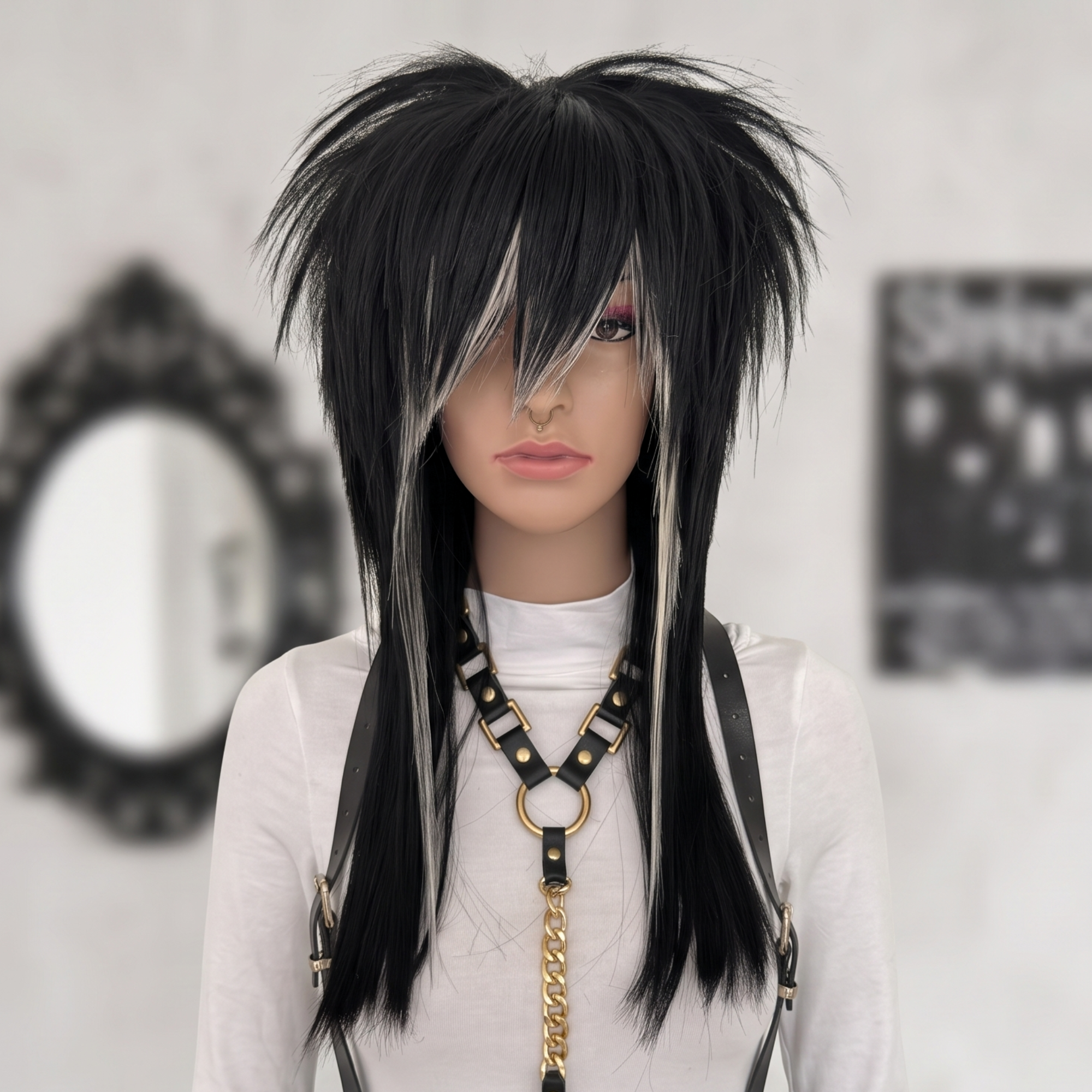 Front view of black and blonde skunk stripe emo wig with spiky layered crown and long straight lengths.