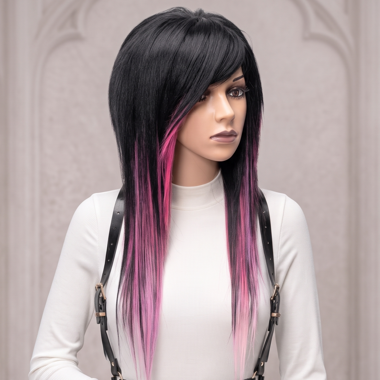 Mannequin wearing black and pink emo wig with voluminous crown, long layered sides and bright pink highlight streaks.