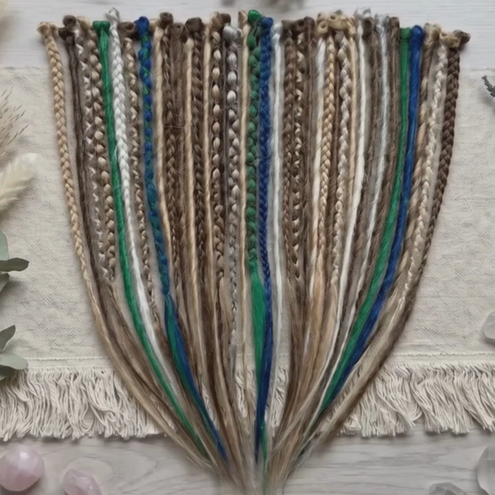 Showcase video of brown blonde dreadlock extensions with blue and green accents, featuring handmade loose end synthetic dreads available as single ended or double ended.