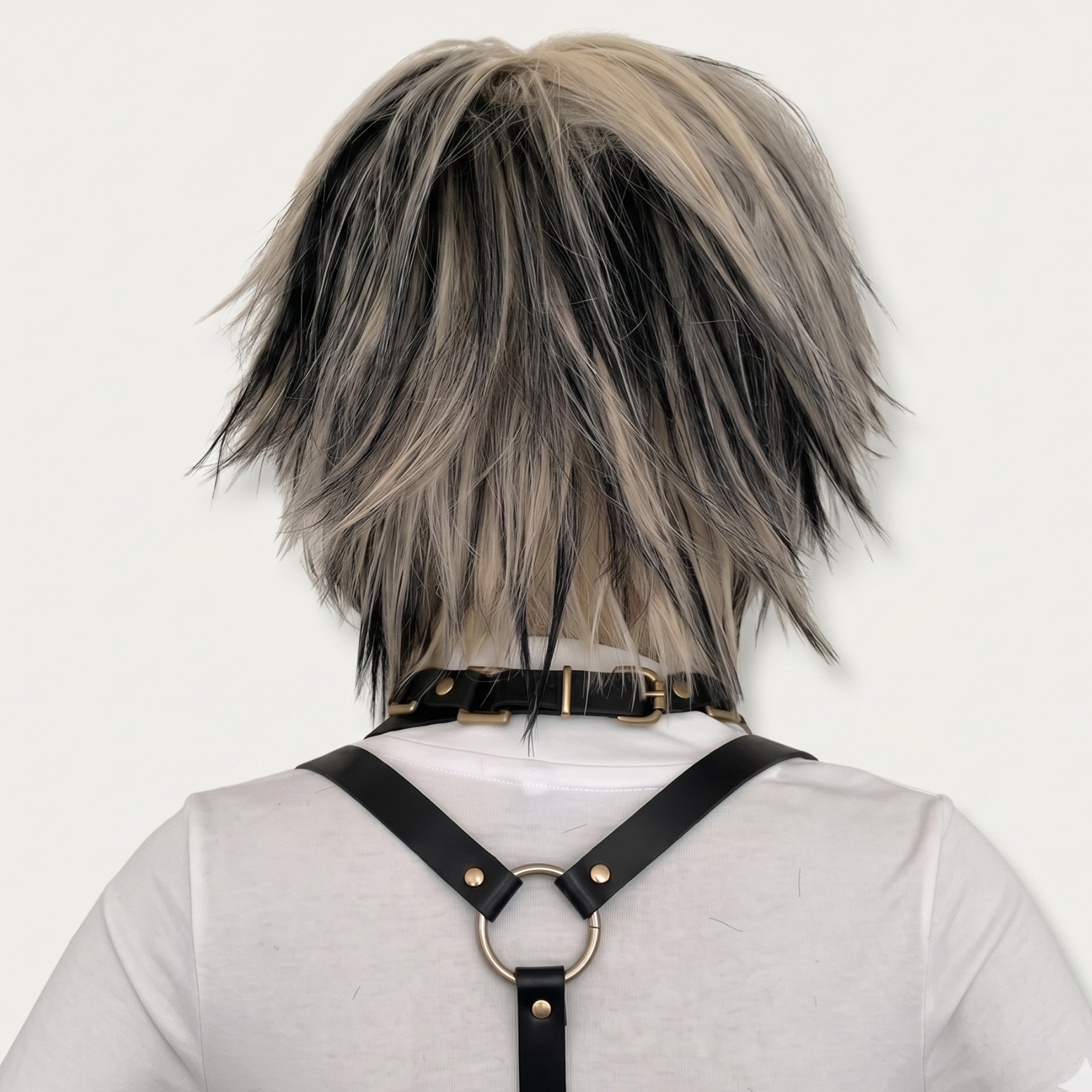 Back view of short blonde and black scene wig with spiky layered cut and textured volume, Y2K alternative emo wig.