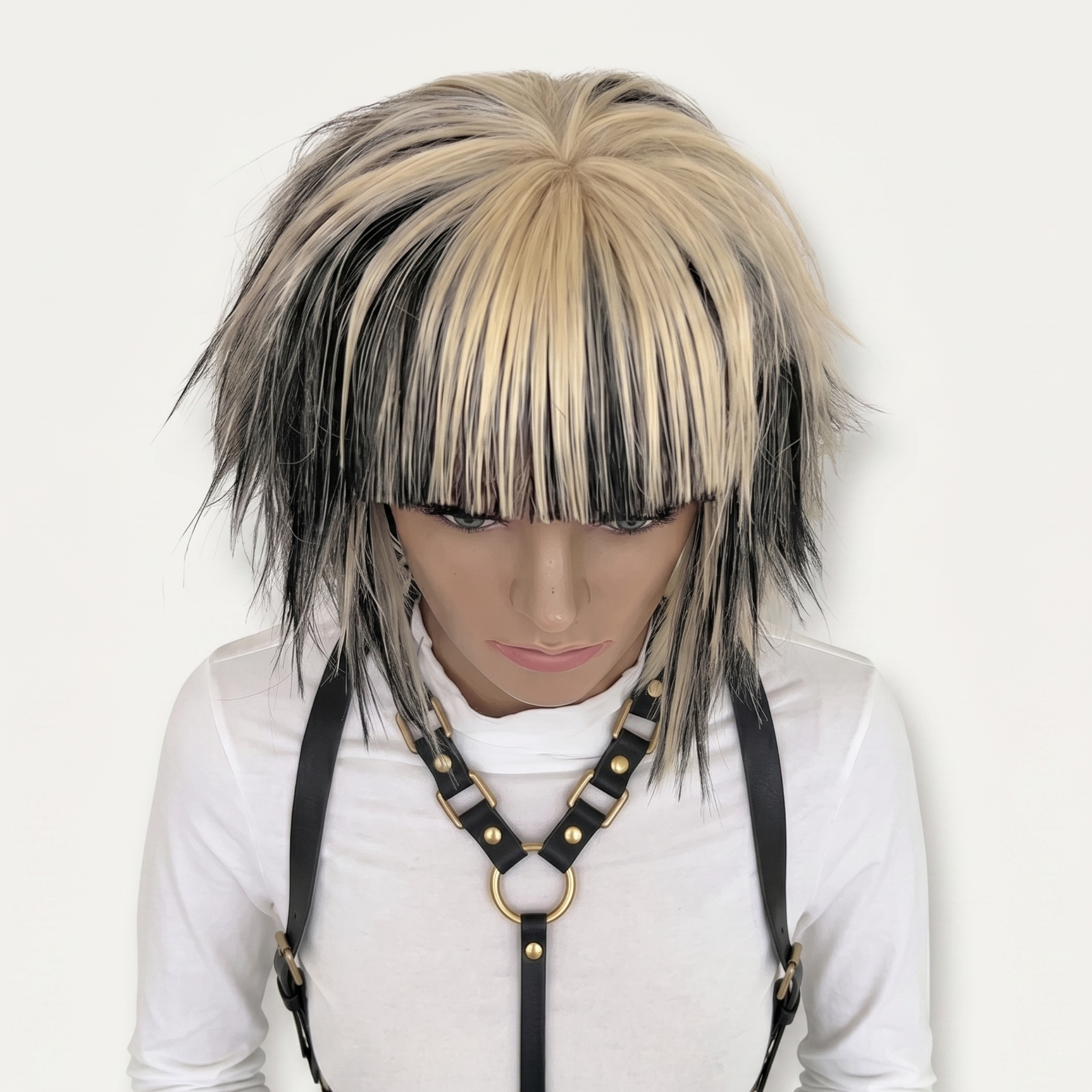 Spiky layered blonde and black scene wig with textured crown and choppy bangs, short punk emo cosplay wig.